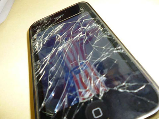 Illustration for article titled The Gizmodo vs. Deadspin iPhone Repair Contest: And The Winner Is...